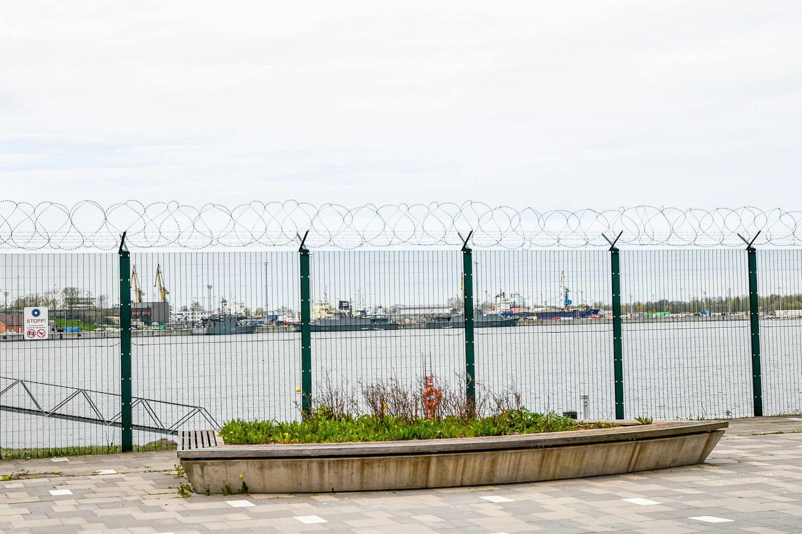 Security fence with razor wire at a port facility